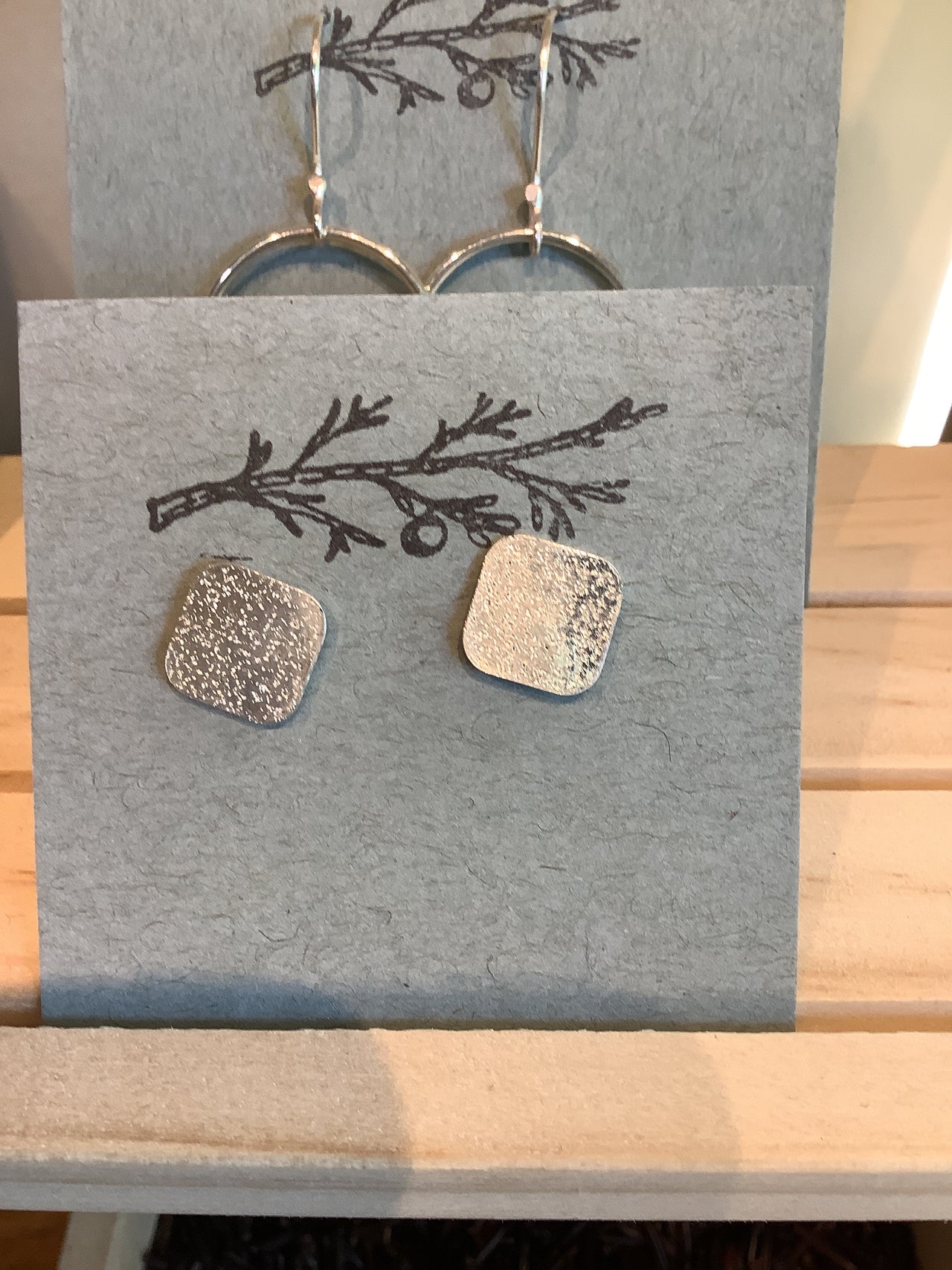One seed design - sterling silver square studs
