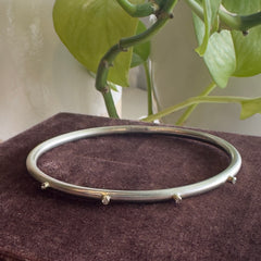 Cindre - Sterling Silver Bangle with 4 Diamonds set in 14k Solid Gold